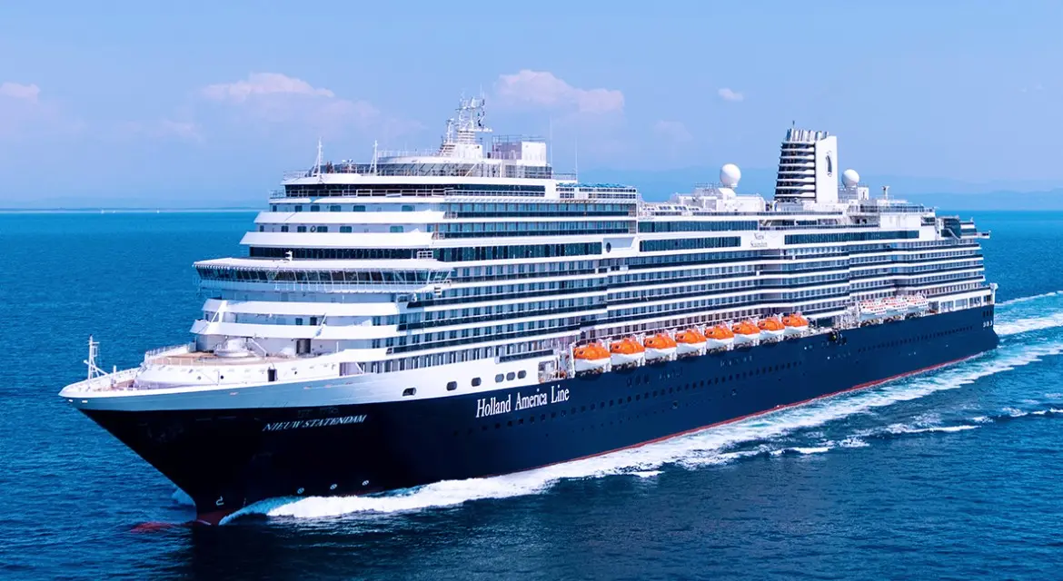 Holland America Line 2026 brand collection: top view of a classic, mid-sized ship at sea representing 150 years of cruising heritage. A birds-eye view of a Holland America vessel showcasing its elegant profile, designed to highlight the brand's 2026 commitment to timeless ocean cruis