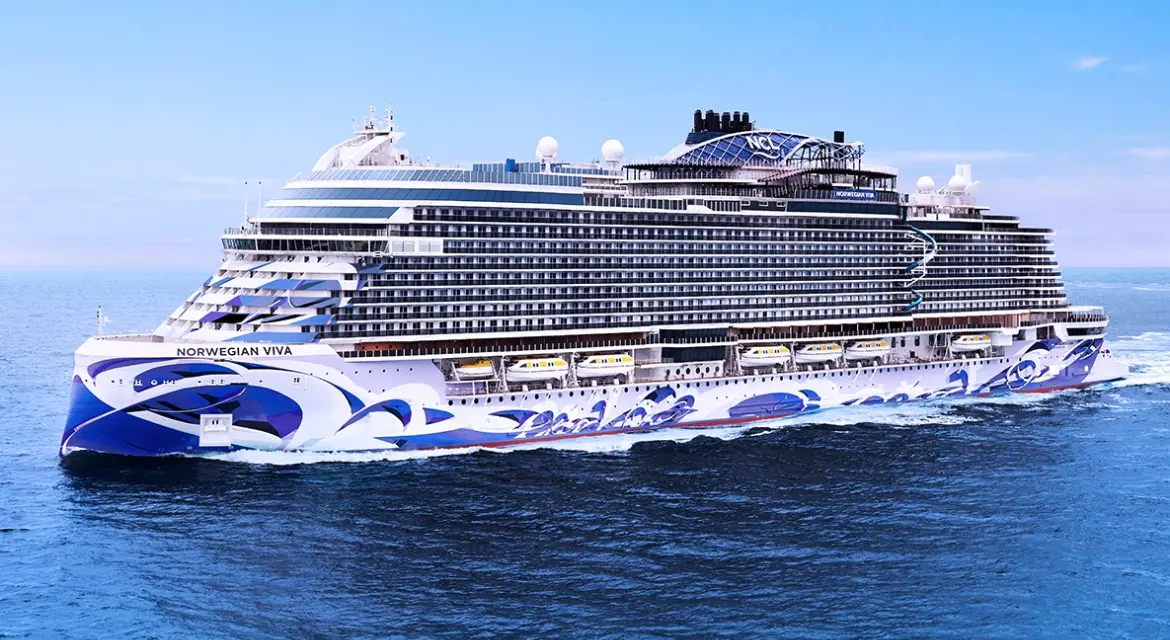 Norwegian Cruise Line 2026 brand collection: side view of a contemporary NCL ship in bright sunlight, representing Freestyle Cruising. Experience 2026 with Norwegian Cruise Line. Enjoy ultimate freedom, flexibility, and relaxed luxury on our stylish, sun-drenched modern vessels.