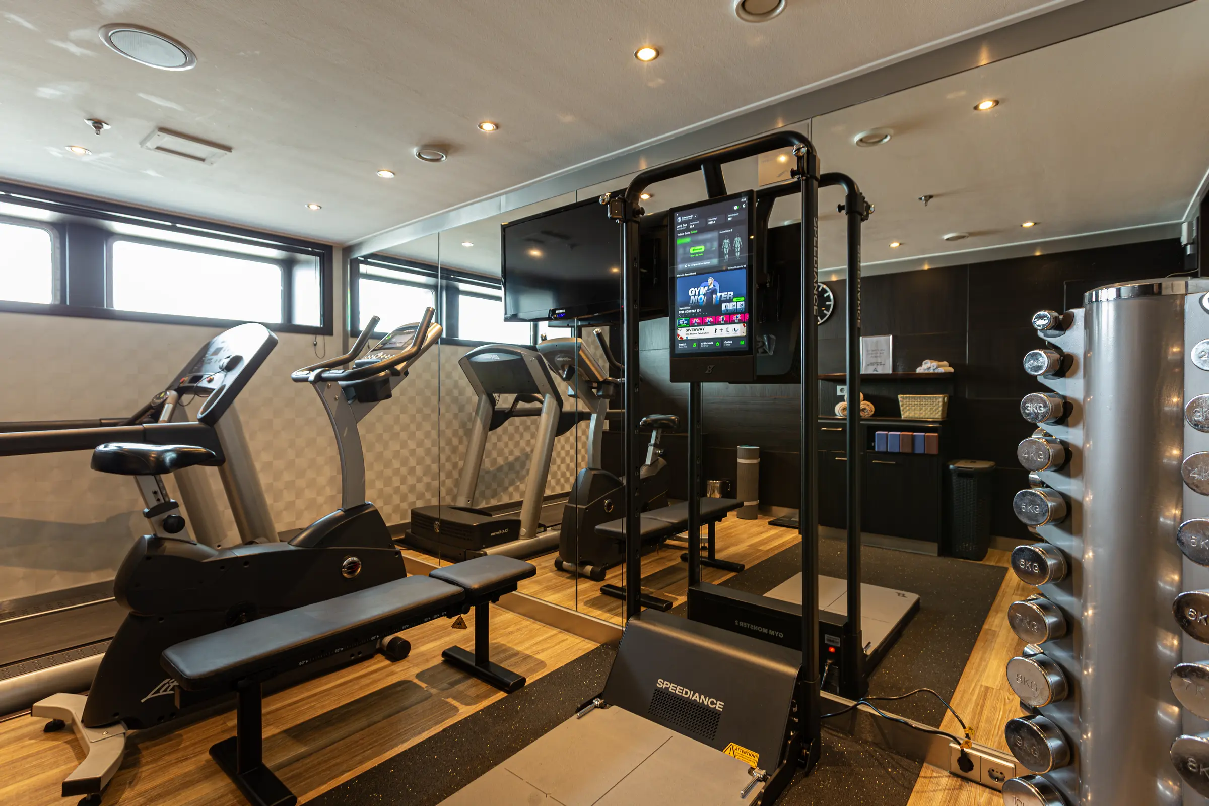 Stay active in the Avalon Waterways onboard gym, featuring high-end equipment and panoramic windows overlooking scenic European rivers. 