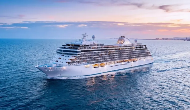 An elegant cover of a Regent ship under sail, highlighting 2026 “Most Inclusive Luxury Experience.