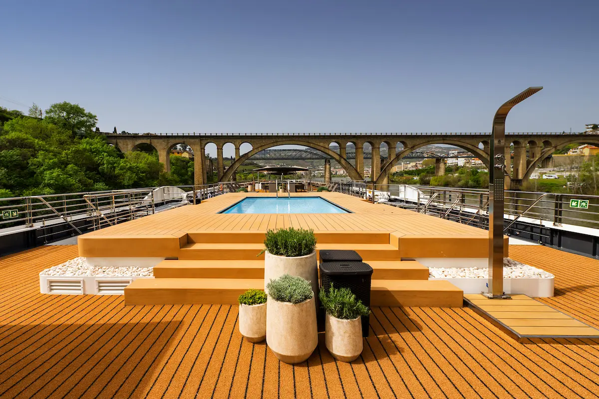 Relax on the expansive Sky Deck of an Avalon Waterways Suite Ship. This open-air luxury space features a premium whirlpool, comfortable lounge chairs.