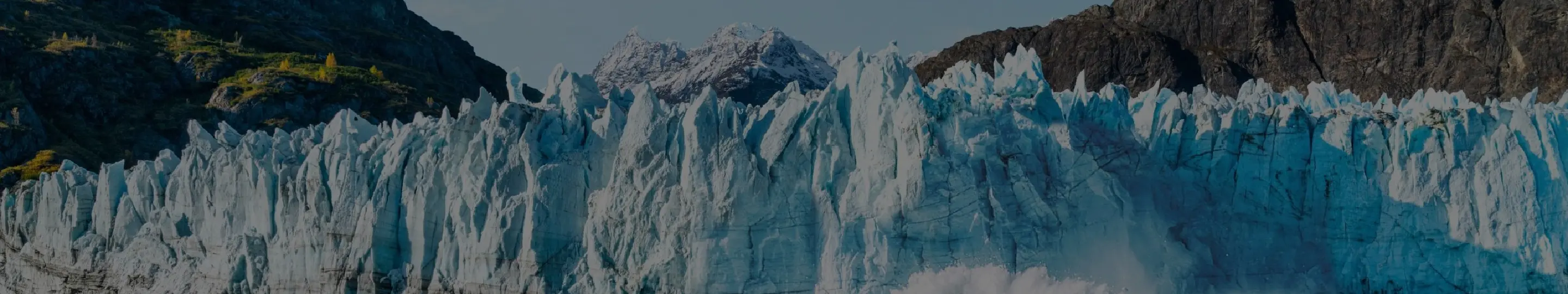 Explore Alaska’s glaciers with Holland America. Witness untamed wilderness and majestic peaks on a premier 2026 voyage.
