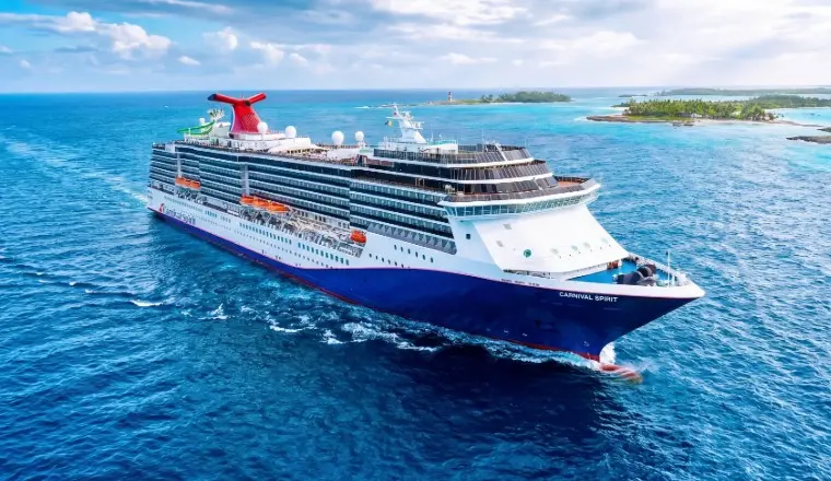 A vibrant cover of a Carnival ship with the BOLT coaster, highlighting 2026 value deals and family Caribbean itineraries.