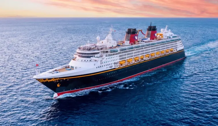 A magical cover of a Disney ship, highlighting 2026 itineraries and private island getaways.
