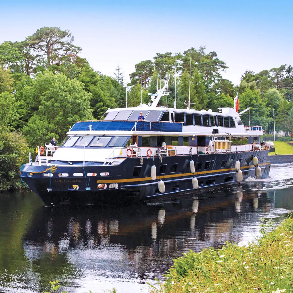Life aboard Lord of the Glens feels like a cross between relaxing in a stately country manor and taking a voyage aboard a private yacht with friends. It is the perfect way to explore the Scottish countryside. She is paneled in polished wood, with teak decks, offering gourmet cuisine, and exceptional personal service. Lord of the Glens accommodates 48 guests in 26 outside cabins. At 150 feet, she is uniquely sized to fit through the network of locks and canals that cut through the heart of the Scottish highlands&mdash;the Caledonian Canal, which connects the North Sea to the Atlantic. And, she can also navigate the coastline and venture to the islands of the Inner Hebrides, making her the only vessel that can cut across the country and explore islands in the Atlantic in such grand style.