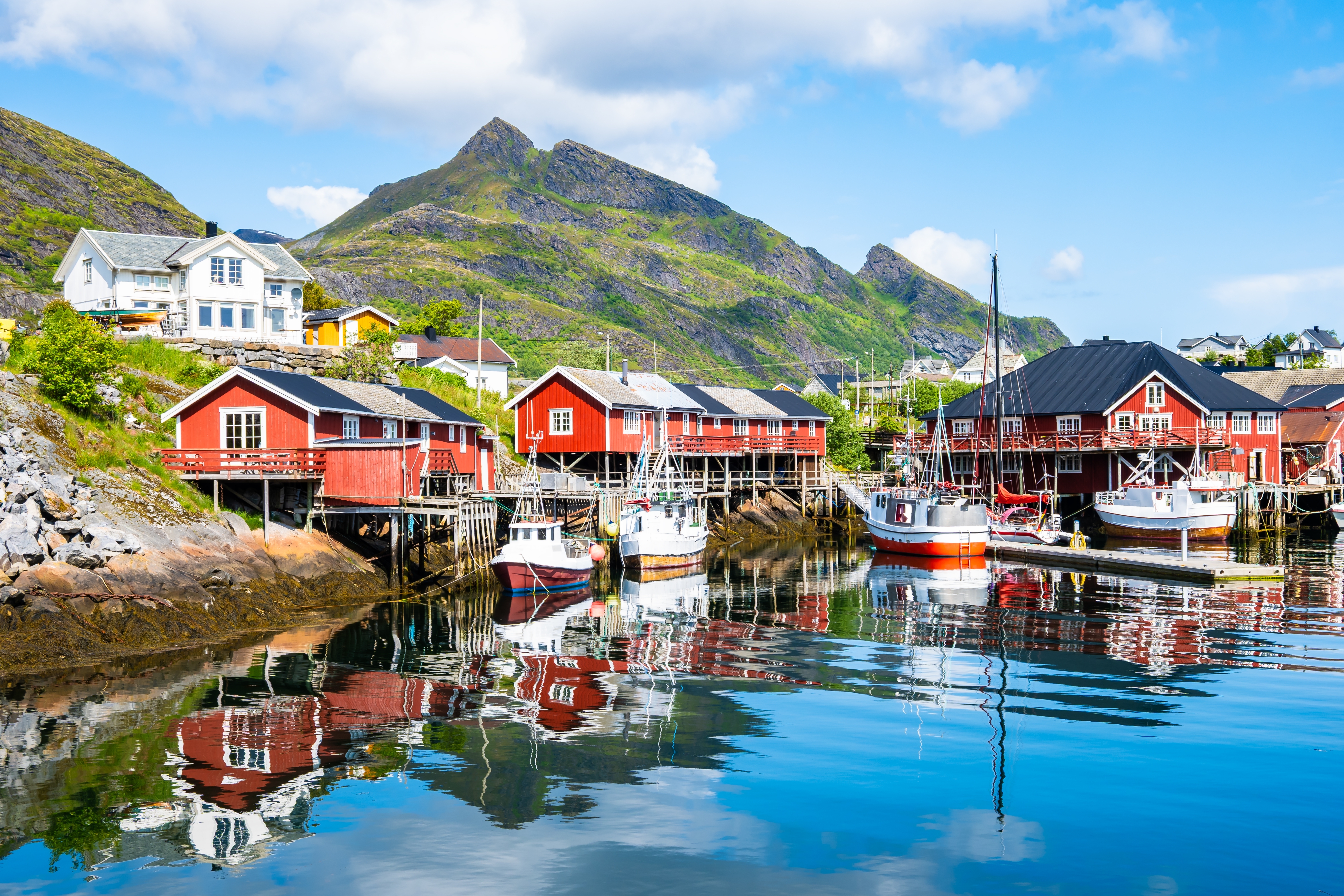 Beautiful Sorvagen village in nothern Norway, southwest Lofoten, village with typical wooden red cabins