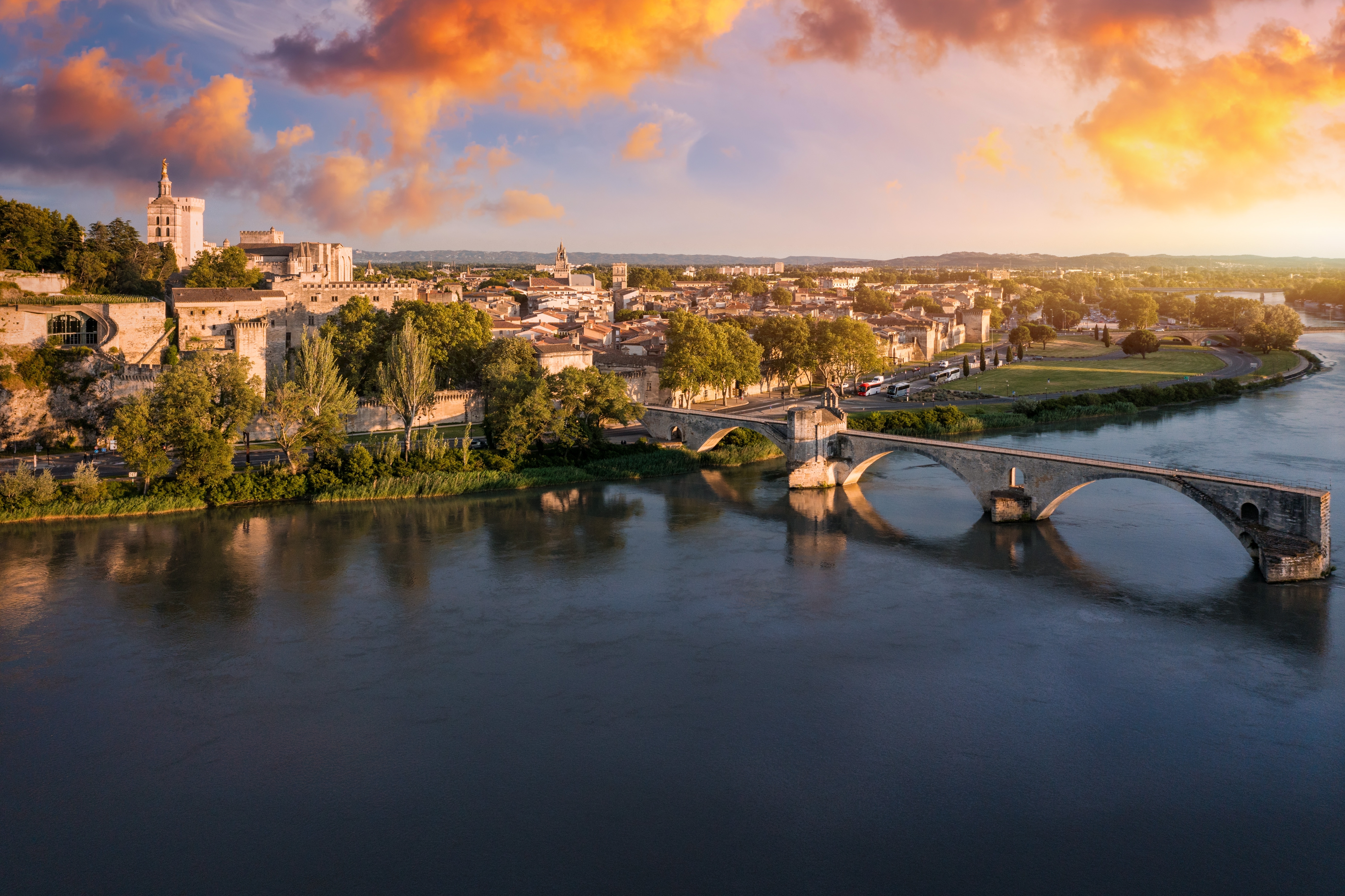 Beautiful view of Avignon with famous bridge Saint-Benezet, medieval architecture along the Rhone River.