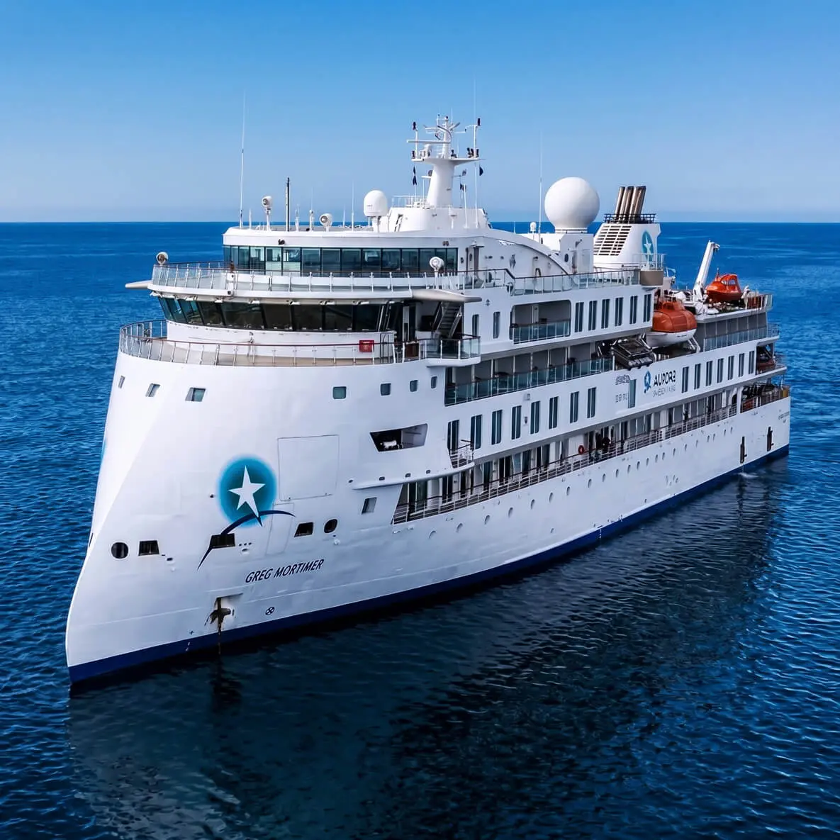 The first passenger ship to feature the revolutionary Ulstein X-BOW&reg;, this allows the ship to cross oceans more comfortably and efficiently, and with expansive observation decks to bring you closer to the environment, inviting communal areas and unsurpassed environmental credentials, the Greg Mortimer offers the perfect base camp for adventures at the outer limits of human exploration. Accommodating an average of 132 expeditioners per voyage within 76 cozy, comfortable cabins &ndash; all cabins have a view of the ocean and 85% of cabins have their own balcony. The ship also features a modern lecture lounge, multiple observation areas, zodiac launching platforms, a restaurant serving excellent meals, a gym and wellness centre, jacuzzies, a mudroom and many other amenities. The Greg Mortimer has redefined expedition cruising for the future.